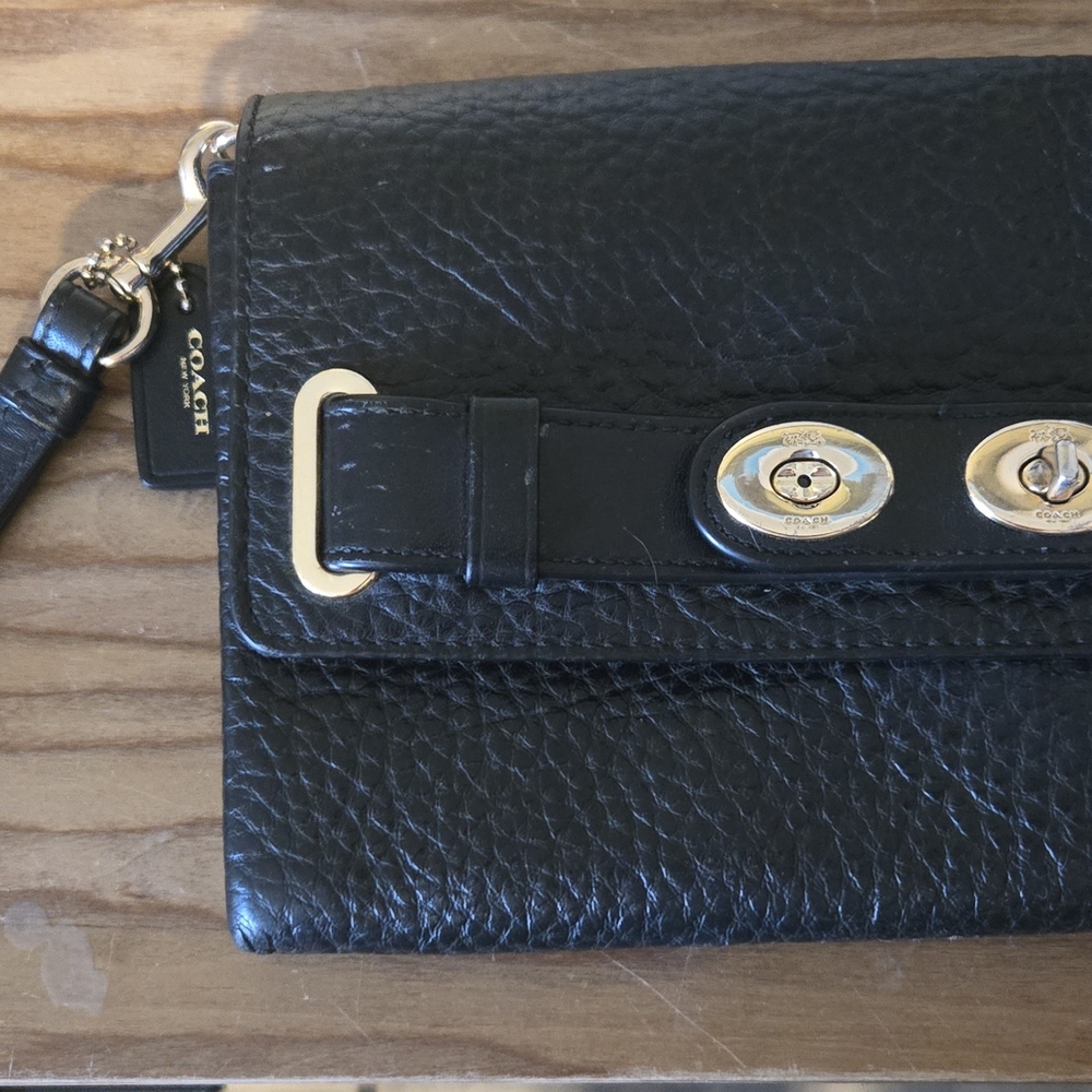 Coach Black Leather Clutch with Gold Accents